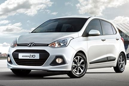 Tổng thể Hyundai Grand i10 2014 màu trắng, mẫu xe ô tô i10 cũ rất được ưa chuộng
