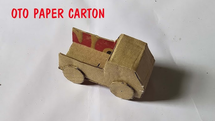 Mô hình xe ô tô tự chế từ thùng carton với các chi tiết được trang trí tỉ mỉ, minh họa cách làm xe ô tô bằng thùng giấy.