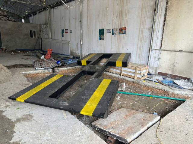 Tổng quan một góc xưởng chăm sóc xe hơi chuyên nghiệp với đầy đủ thiết bị