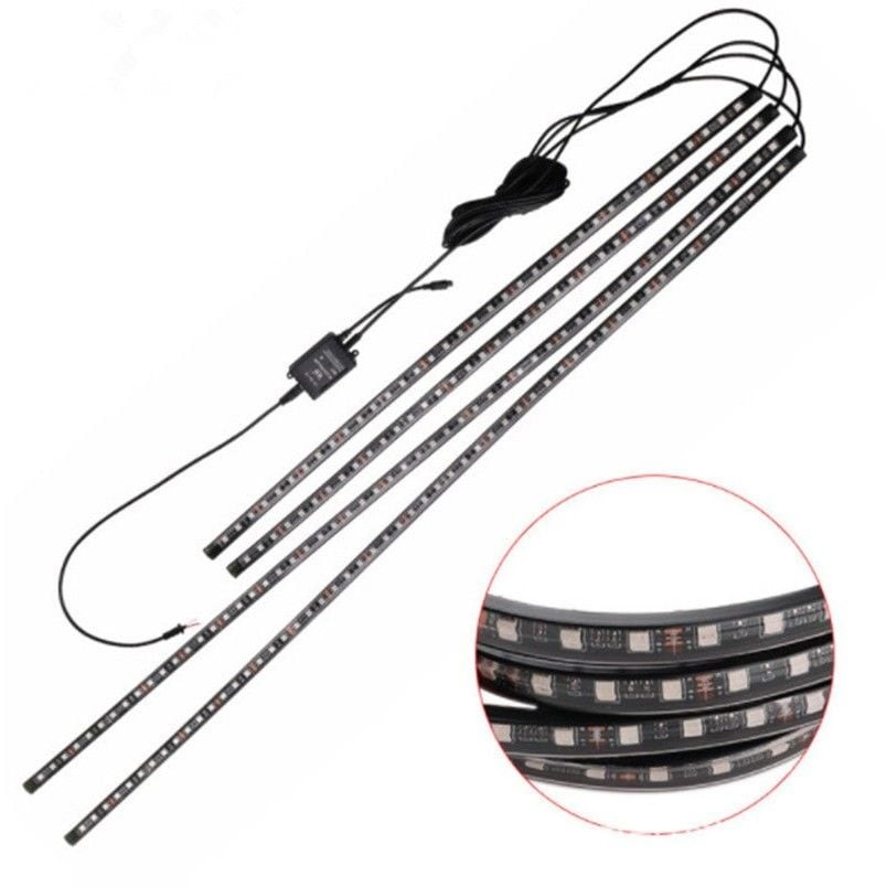 Một chiếc xe ô tô được trang bị hệ thống đèn LED trang trí đa dạng: đèn gầm, đèn nội thất và đèn bánh xe, tạo nên một phong cách độc đáo
