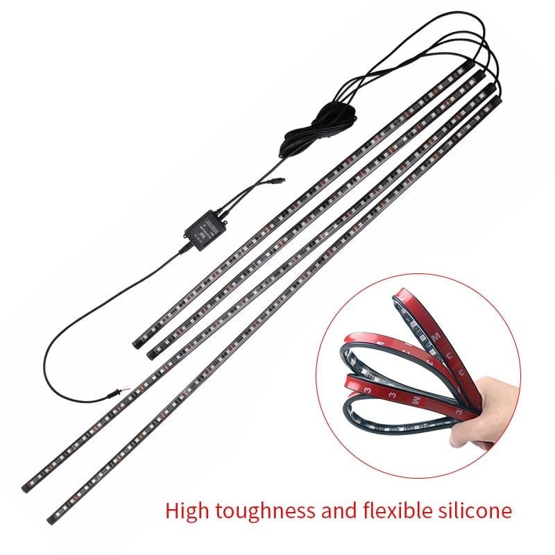 Hình ảnh một chiếc xe ô tô từ xa với đèn LED gầm xe đang tạo hiệu ứng chuyển màu sống động vào ban đêm