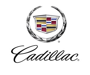 Huy hiệu logo Cadillac với vương miện và vòng nguyệt quế cách điệu, tượng trưng cho sự quý tộc và sang trọng