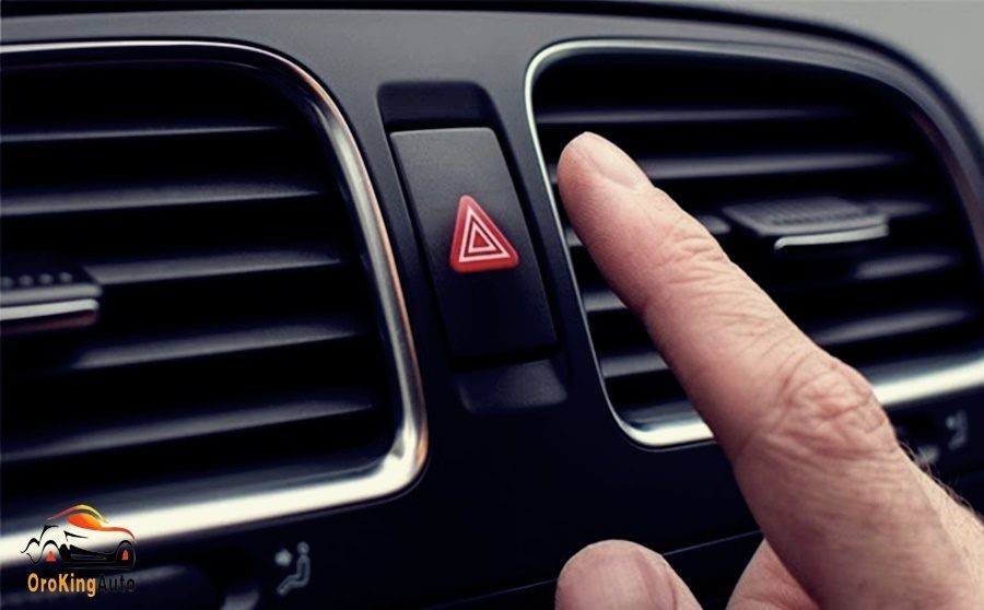 Nút cảnh báo nguy hiểm (Hazard) hình tam giác màu đỏ trên taplo, hướng dẫn sử dụng các nút trên xe ô tô khi khẩn cấp