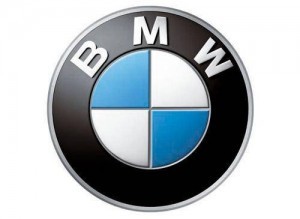 Logo BMW với biểu tượng màu xanh và trắng, thể hiện di sản và tầm nhìn tương lai của thương hiệu xe ô tô 7 chỗ BMW.