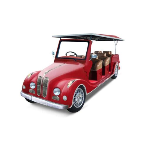 Xe ô tô điện mini Trung Quốc màu xanh di chuyển trên đường